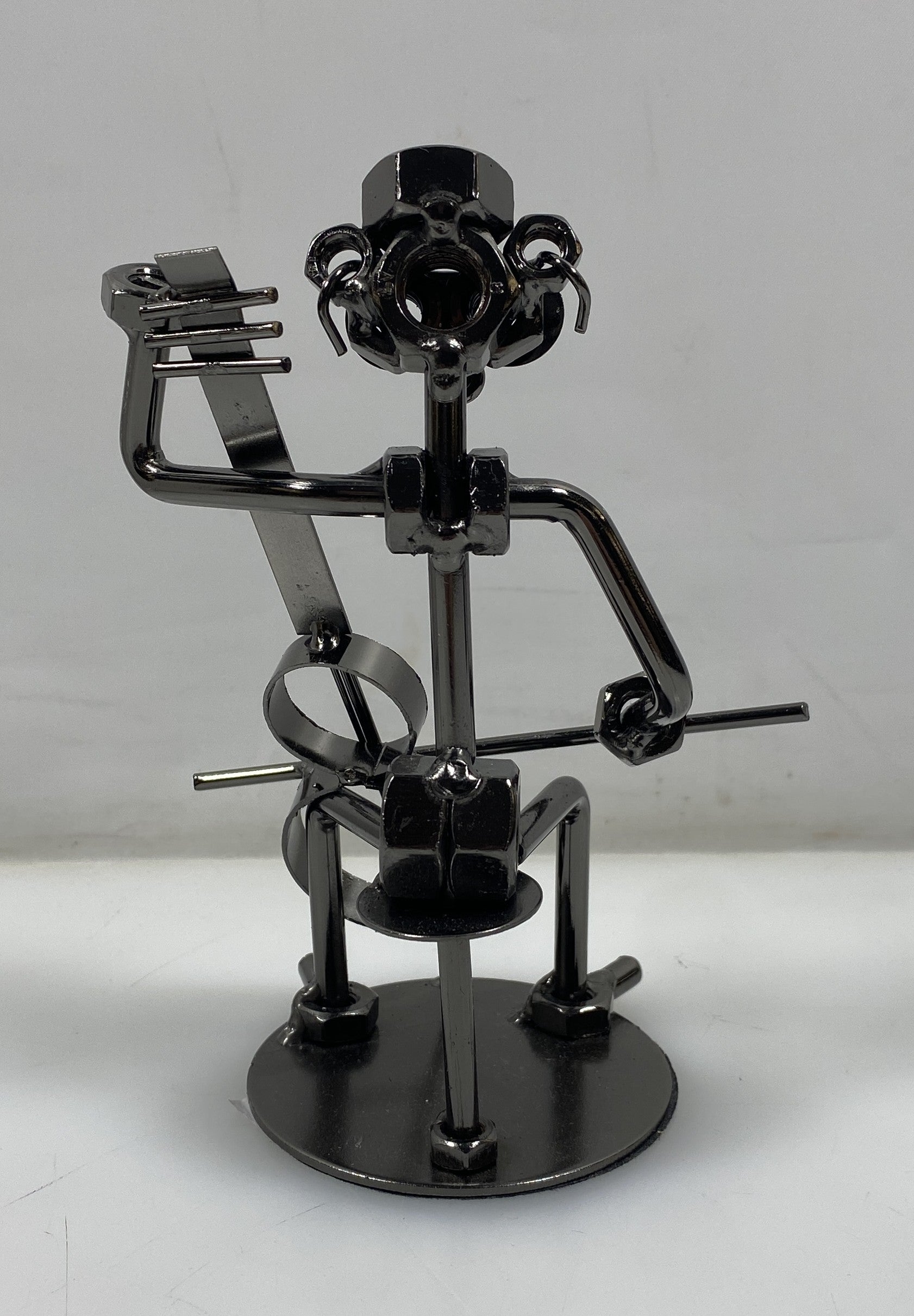 Silver Nuts and Bolts Cellist Metal Figurine With Circular Base