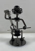 Silver Nuts and Bolts Cellist Metal Figurine With Circular Base