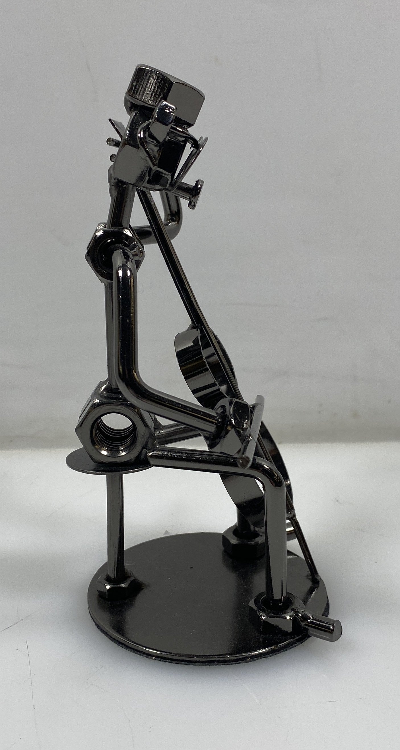 Silver Nuts and Bolts Cellist Metal Figurine With Circular Base