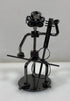 Silver Nuts and Bolts Cellist Metal Figurine With Circular Base