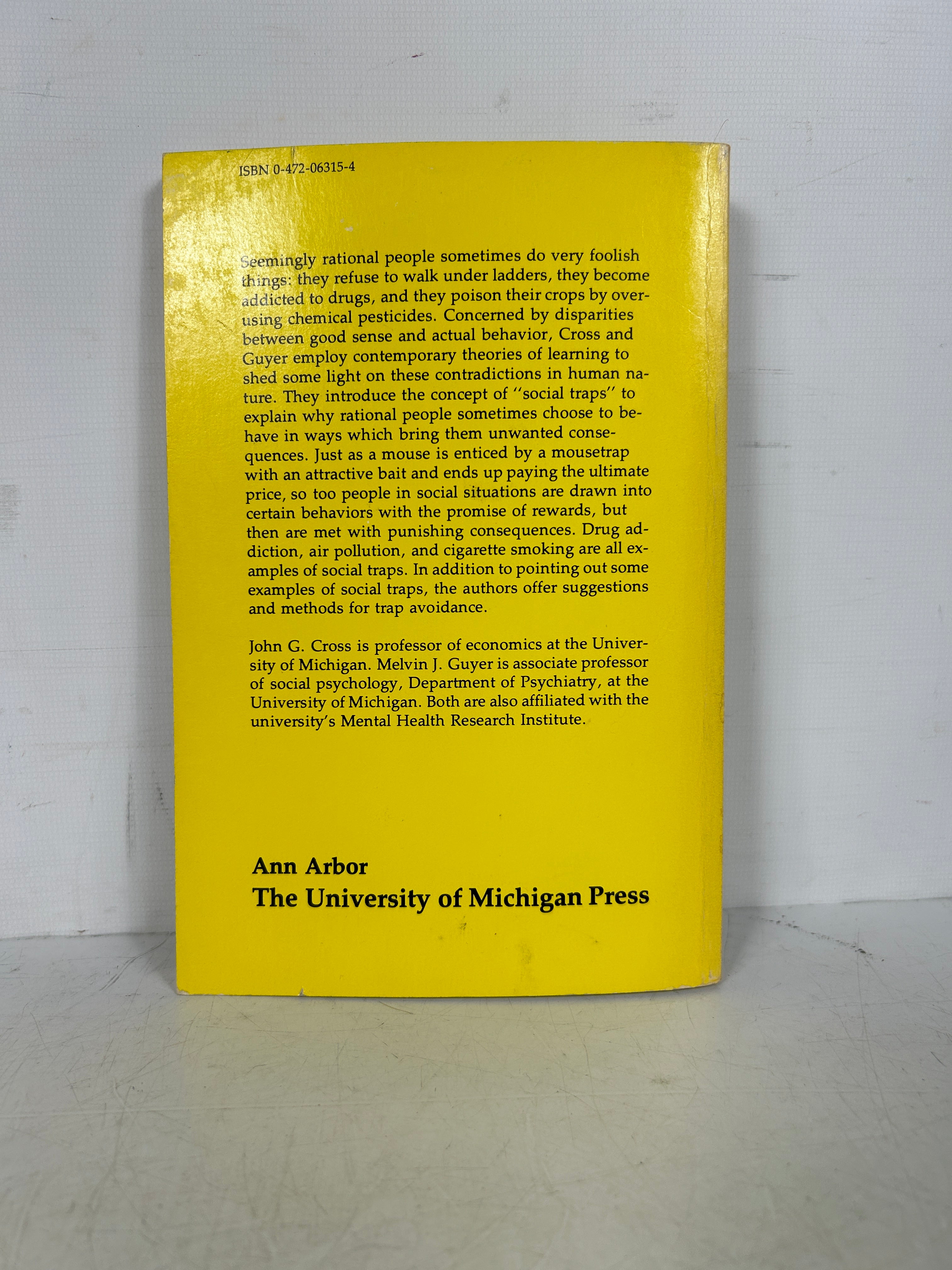 Social Traps Paperback – January 1, 1980 by John G. Cross SC