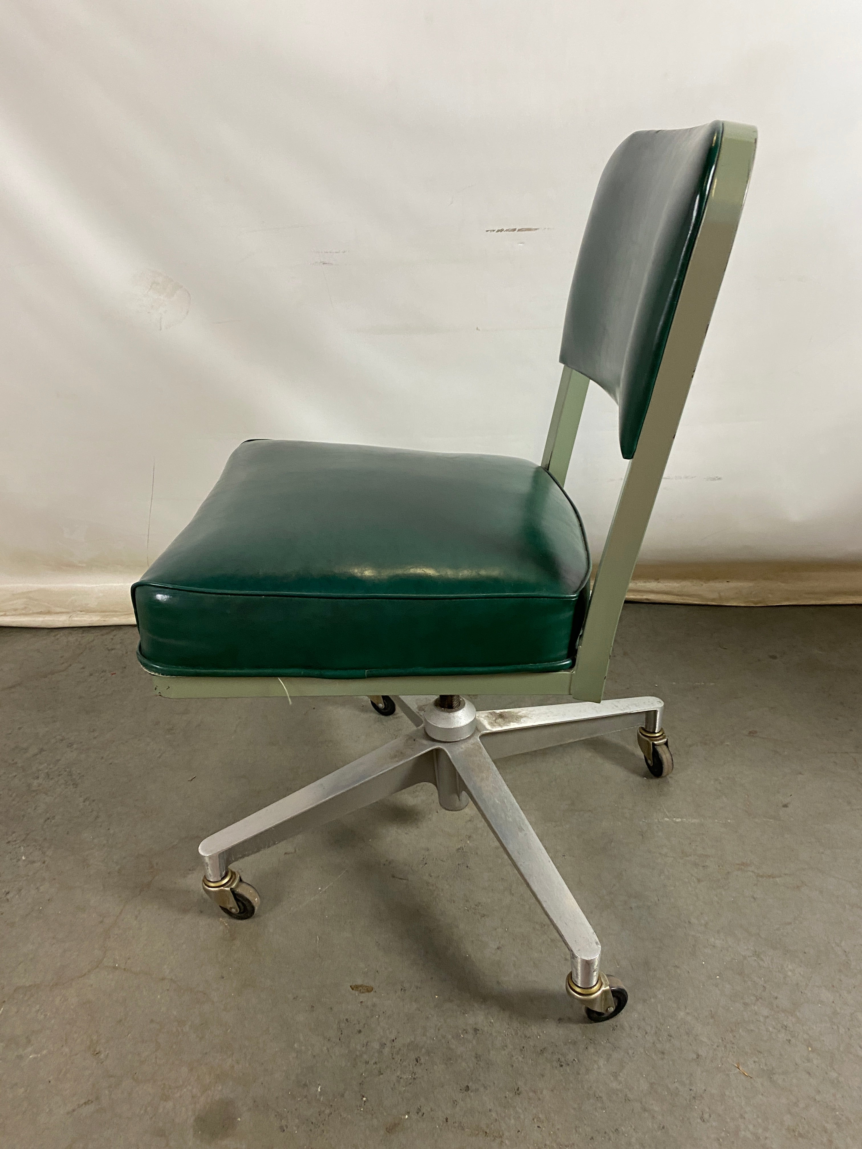 Steelcase Dark Green Rolling Chair