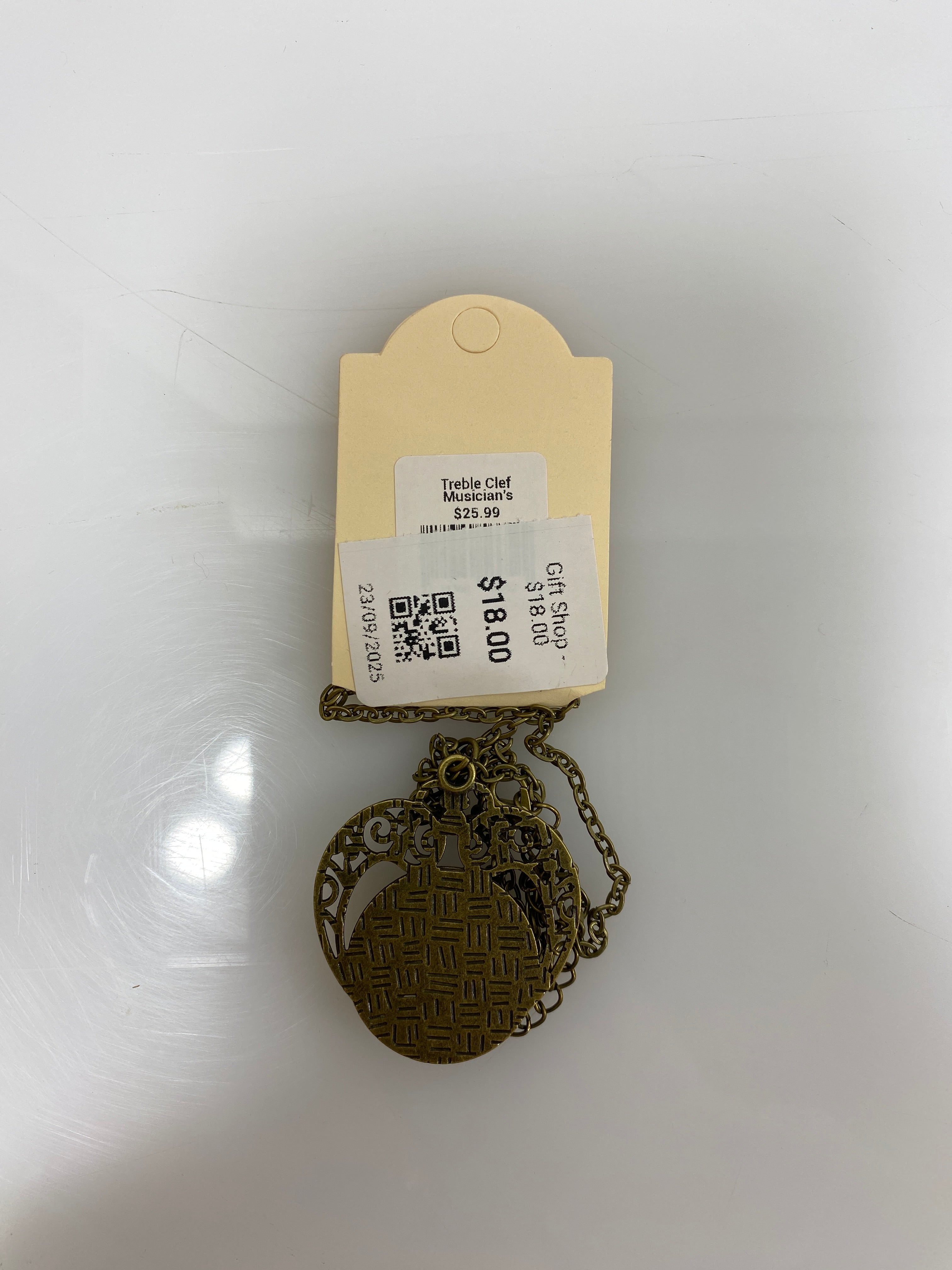 The Divine Iguana Treble Clef Musician's Necklace