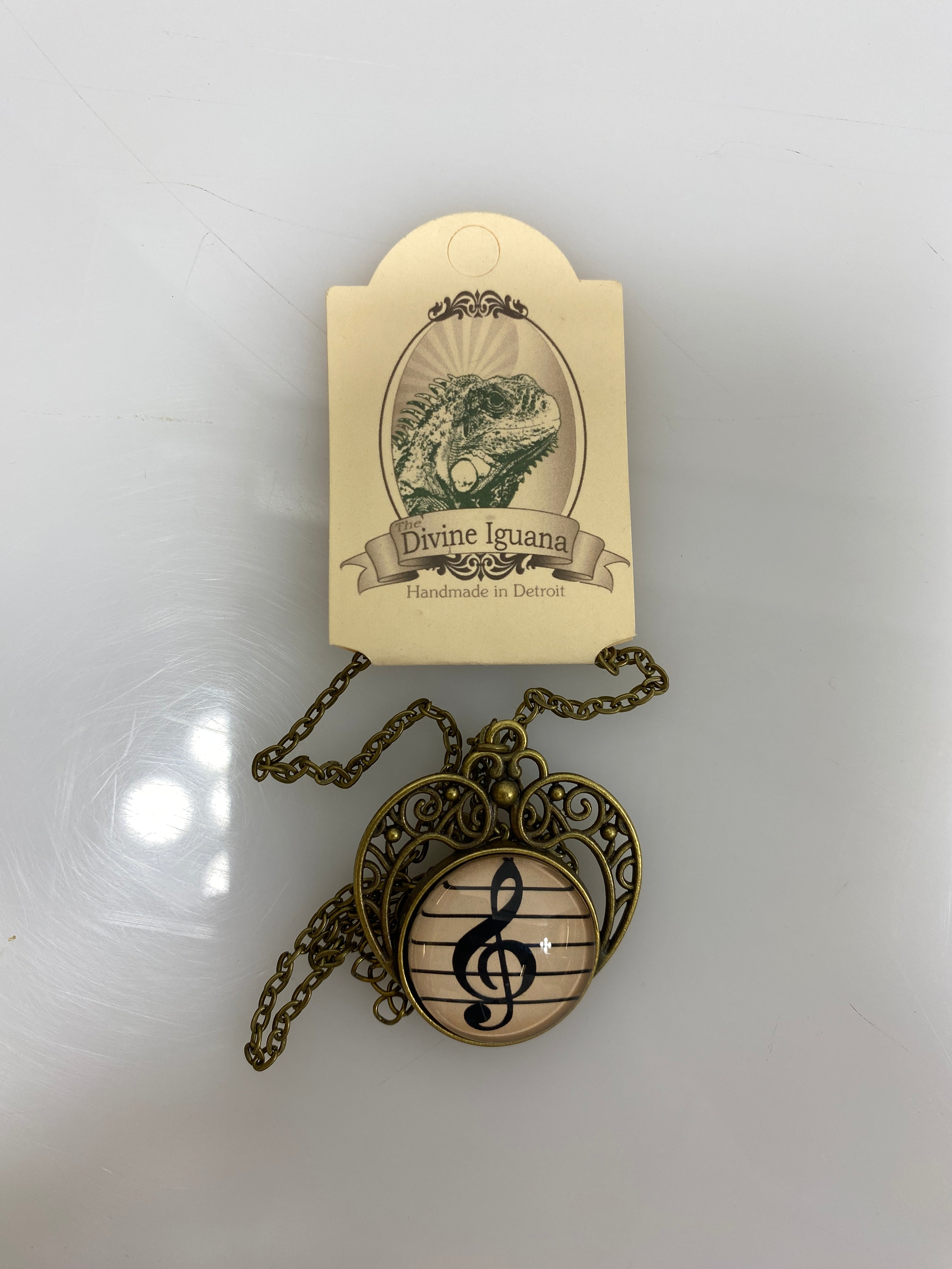 The Divine Iguana Treble Clef Musician's Necklace