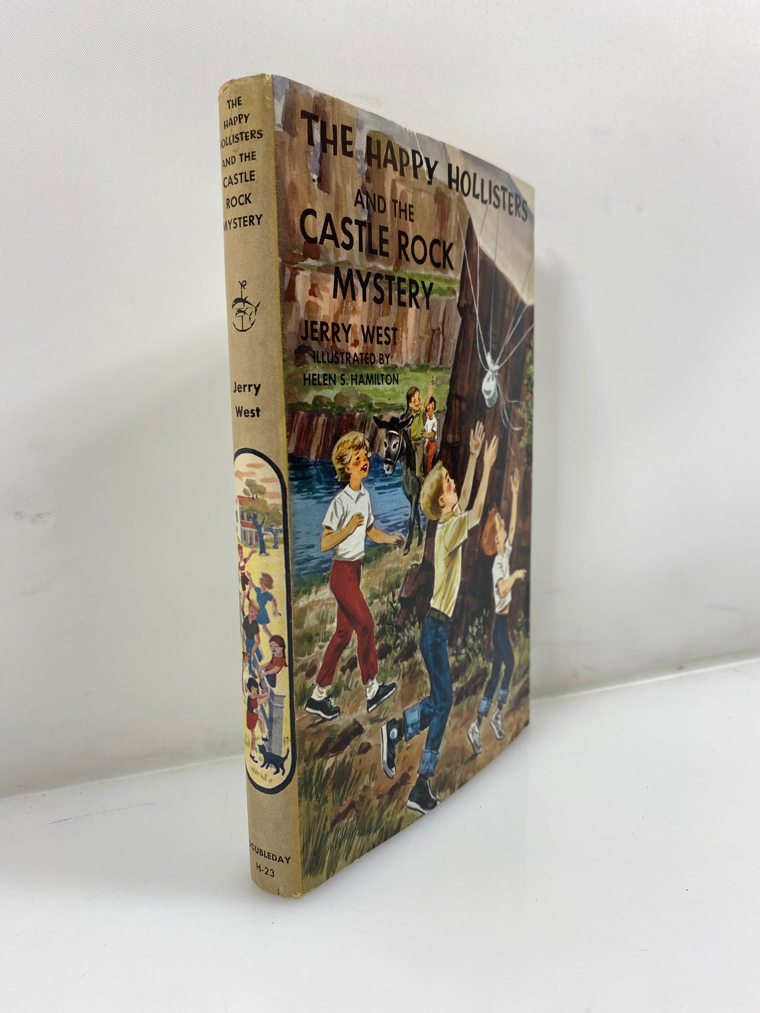 The Happy Hollisters & the Castle Rock Mystery by West 1963 HCDJ