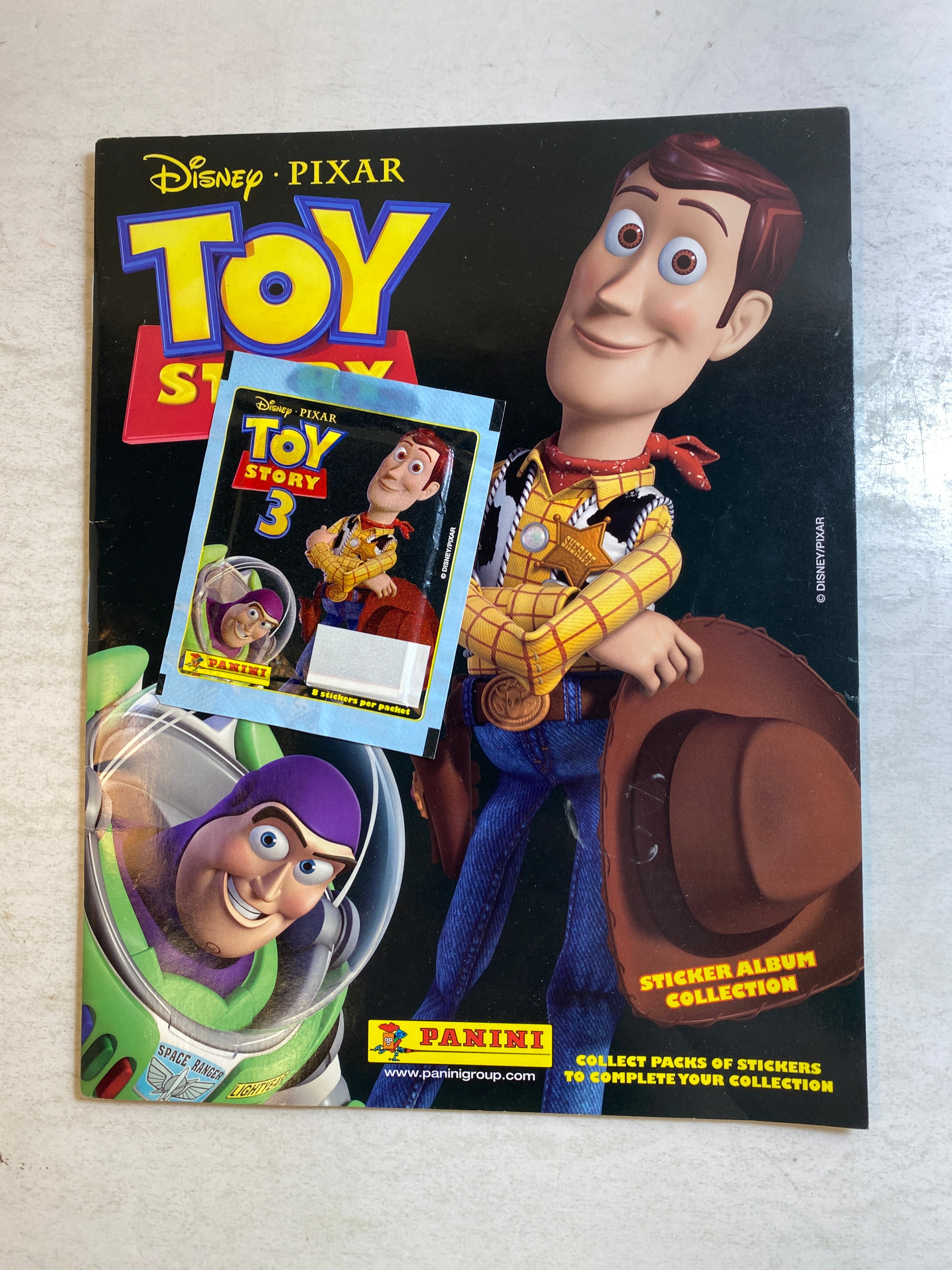 Toy Story 3 Panini Sticker Book w/ unopened packet of stickers *New*
