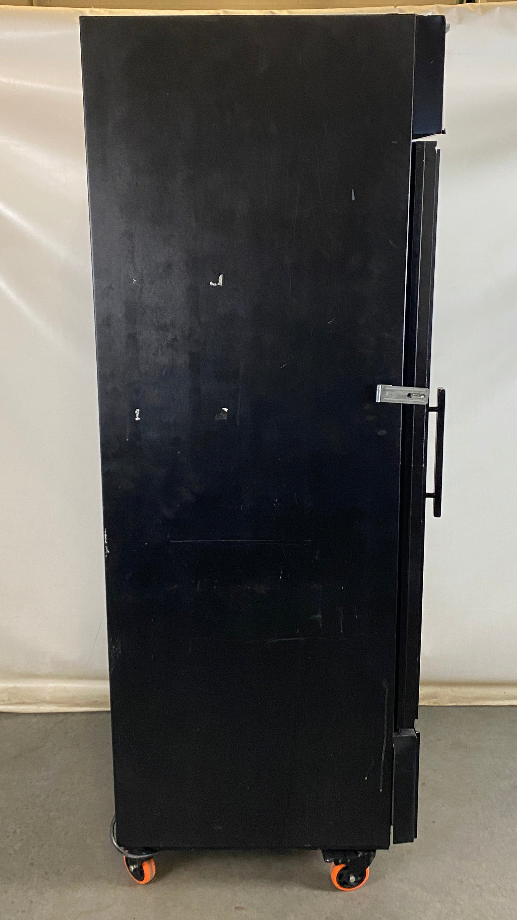 True Manufacturing Company #GDM-026 Black Refrigerator w/ Wheels