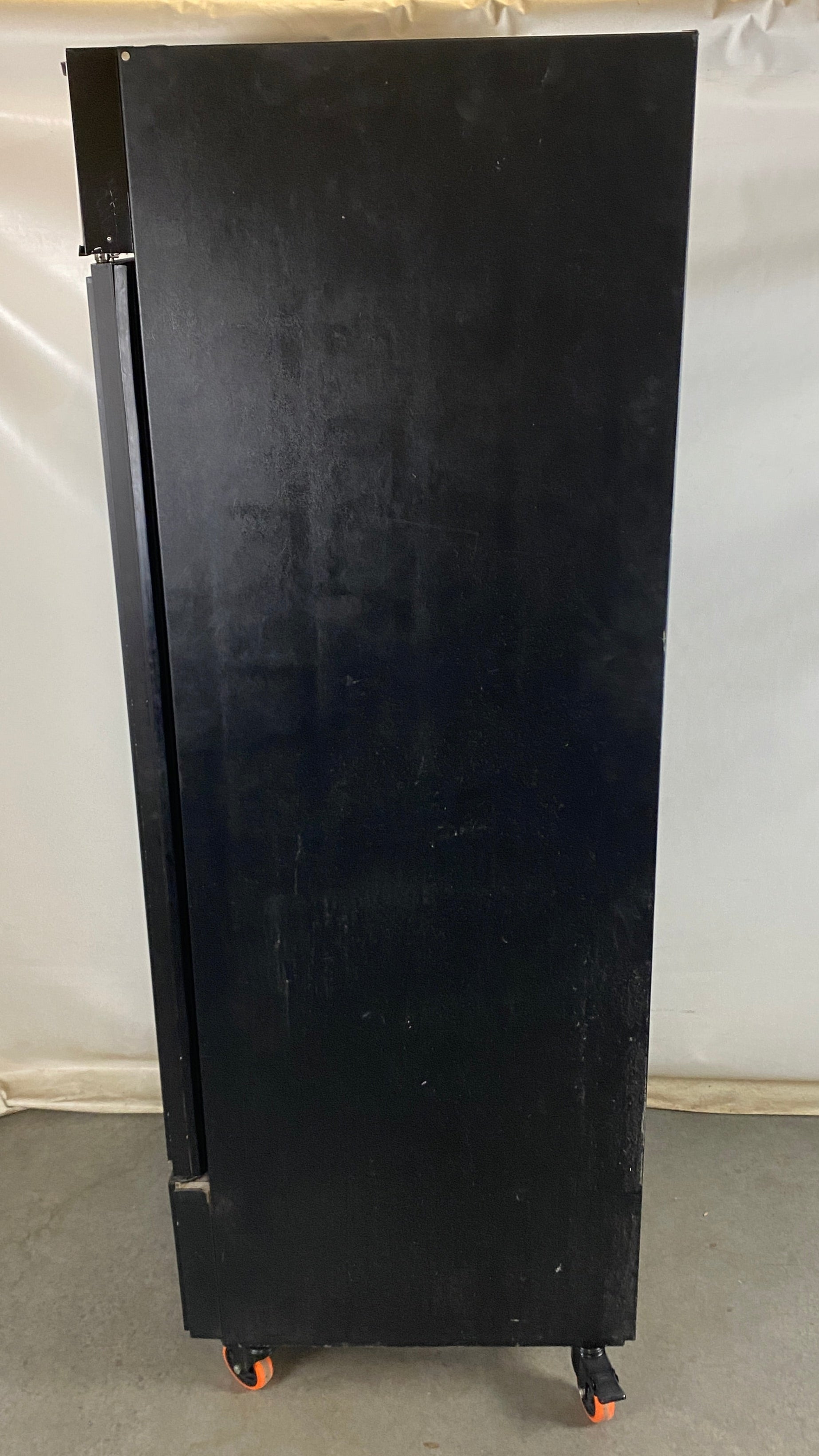 True Manufacturing Company #GDM-026 Black Refrigerator w/ Wheels