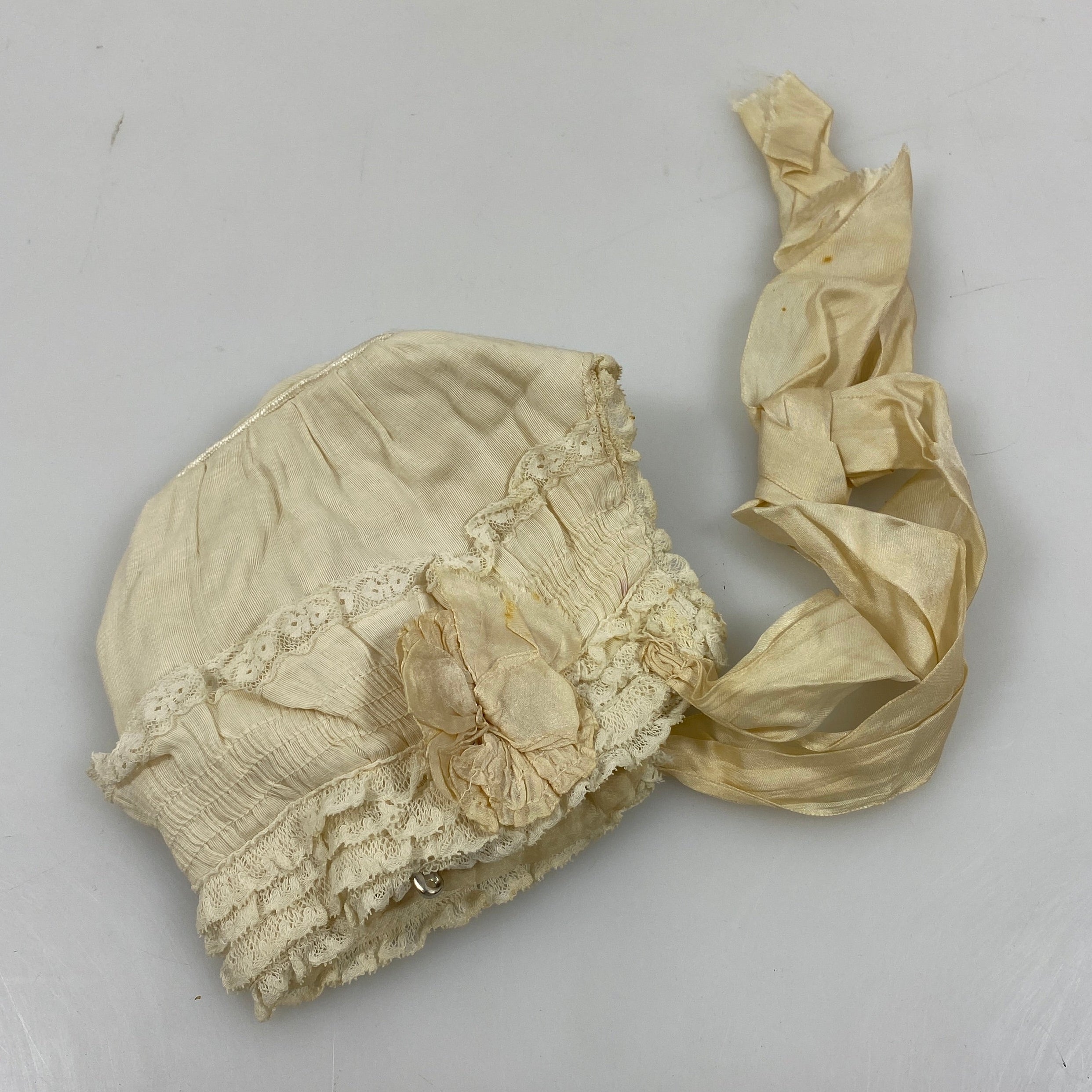 Vintage 1913 White Bonnet with Frilly Lace Details and Floral Appliques