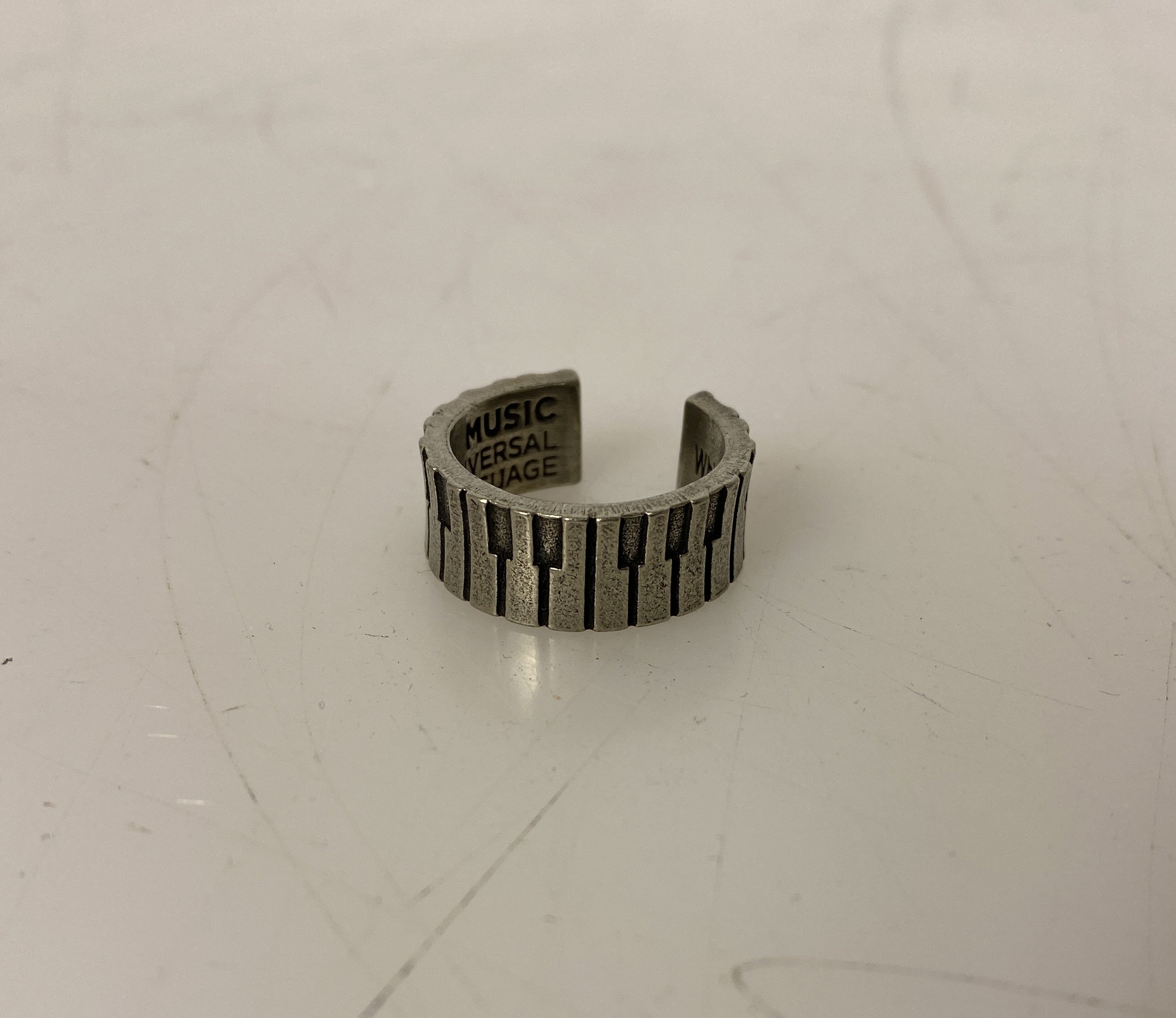 Whitney Howard Music the Universal Language Piano Keys Ring